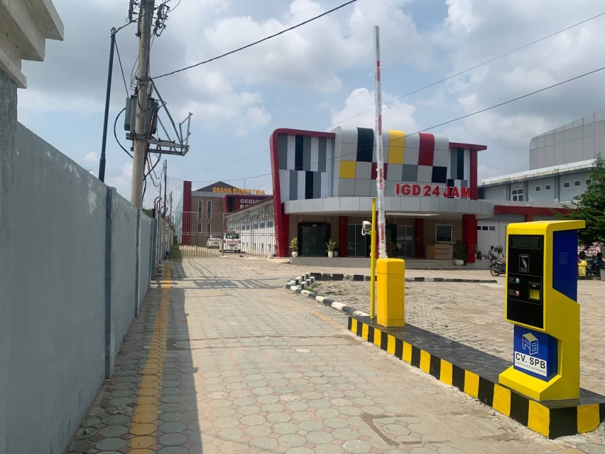 . Implementasi Sistem Parkir Terintegrasi untuk Kawasan Komersial Besar